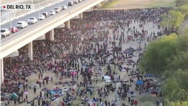 Biden’s Border Crisis: More Than 8,000 Migrants Wait under Texas Bridge